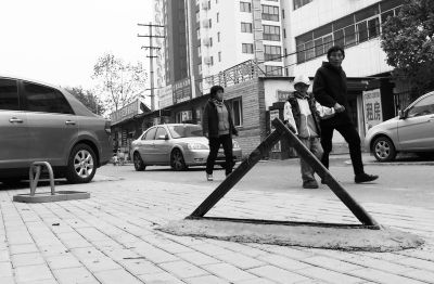 停車管理：北京通過(guò)停車管理辦法：私裝地鎖擬